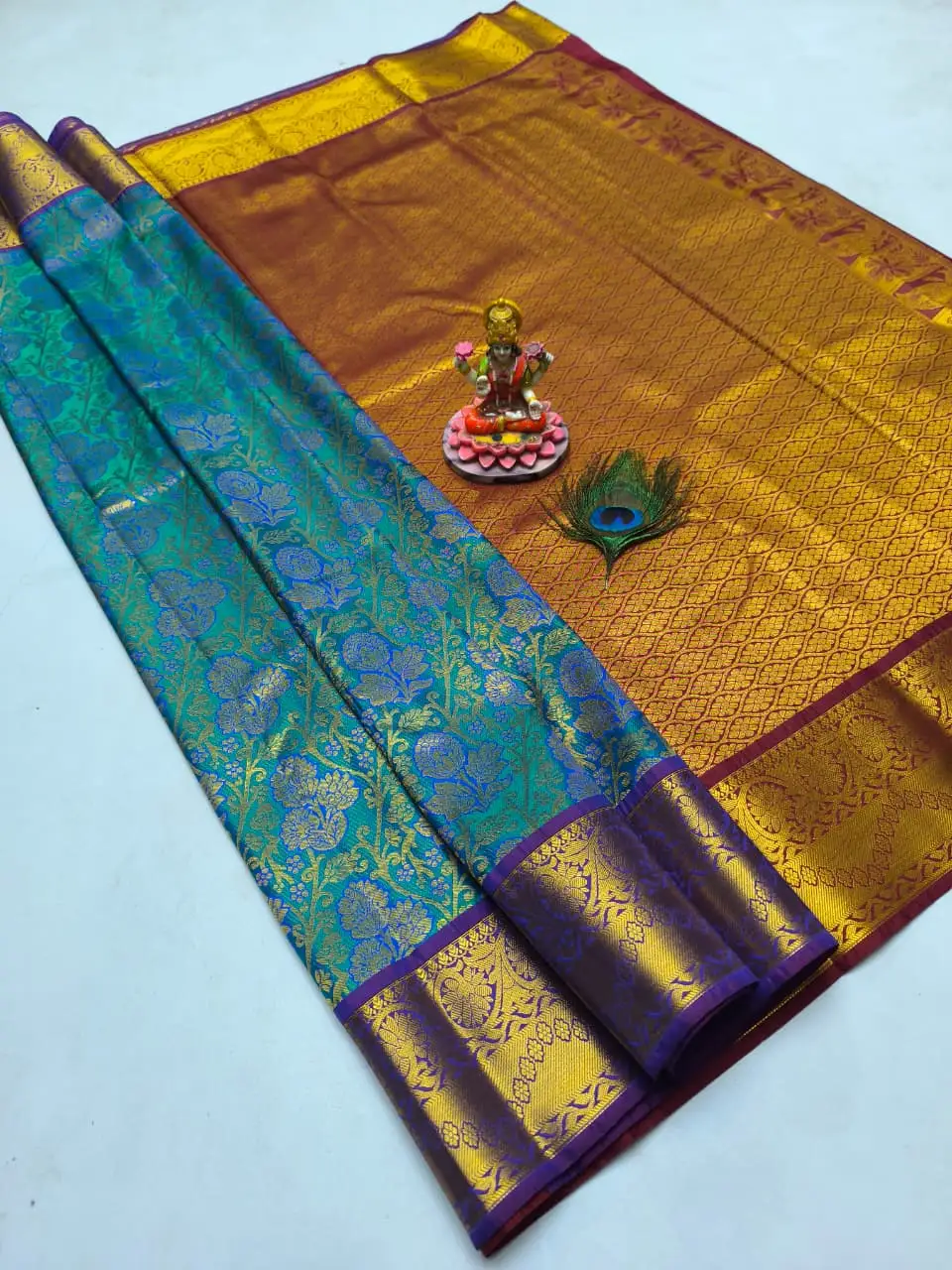 Teal Pushpa Jaal Zari Contrast Border Semi Kanchipuram Silk Saree